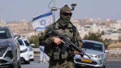 Five Israelis wounded and two suspected Palestinian attackers killed in West Bank shooting