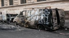 French cities calm overnight after curfews imposed to quell violence, PM says